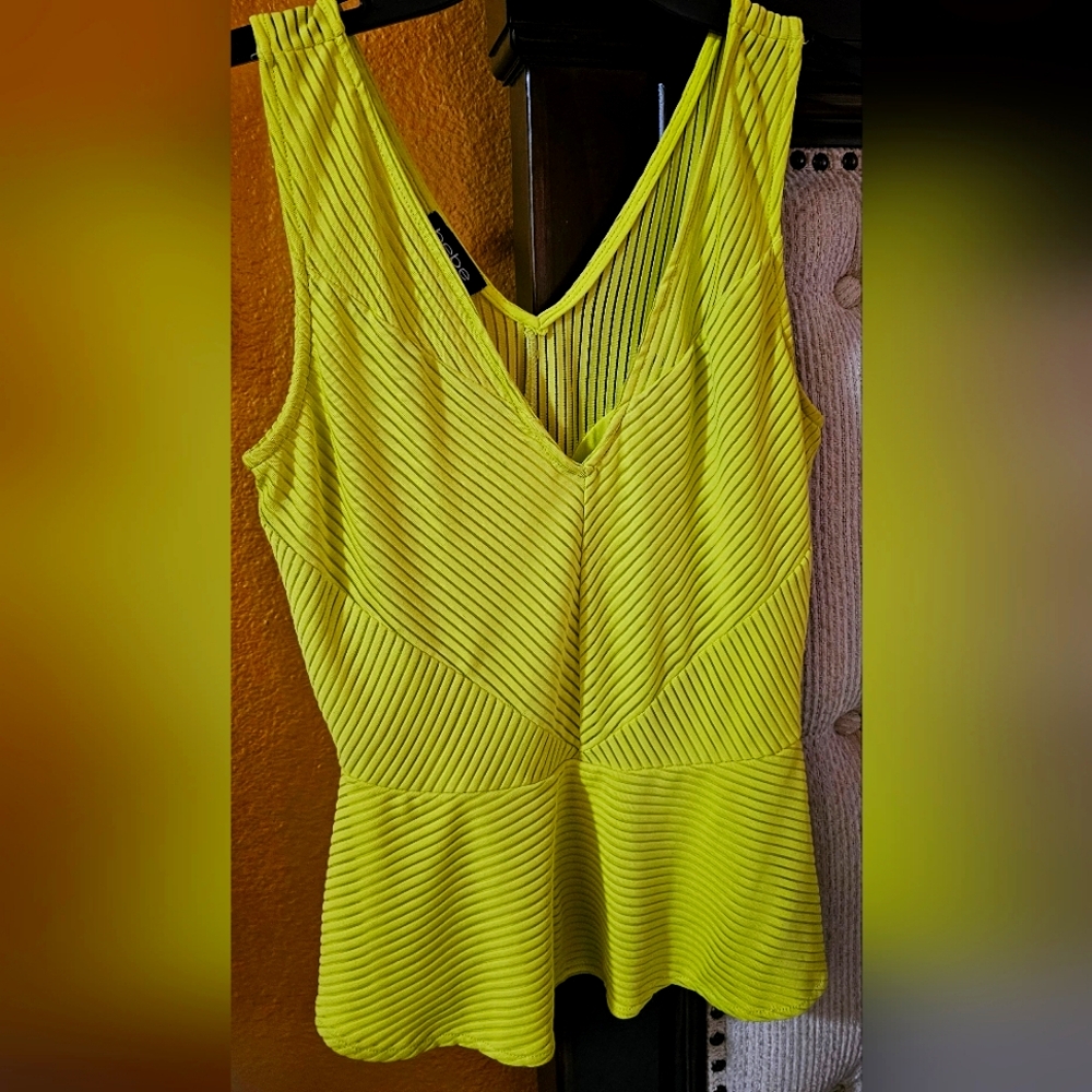 A Bebe florescent green fitted top